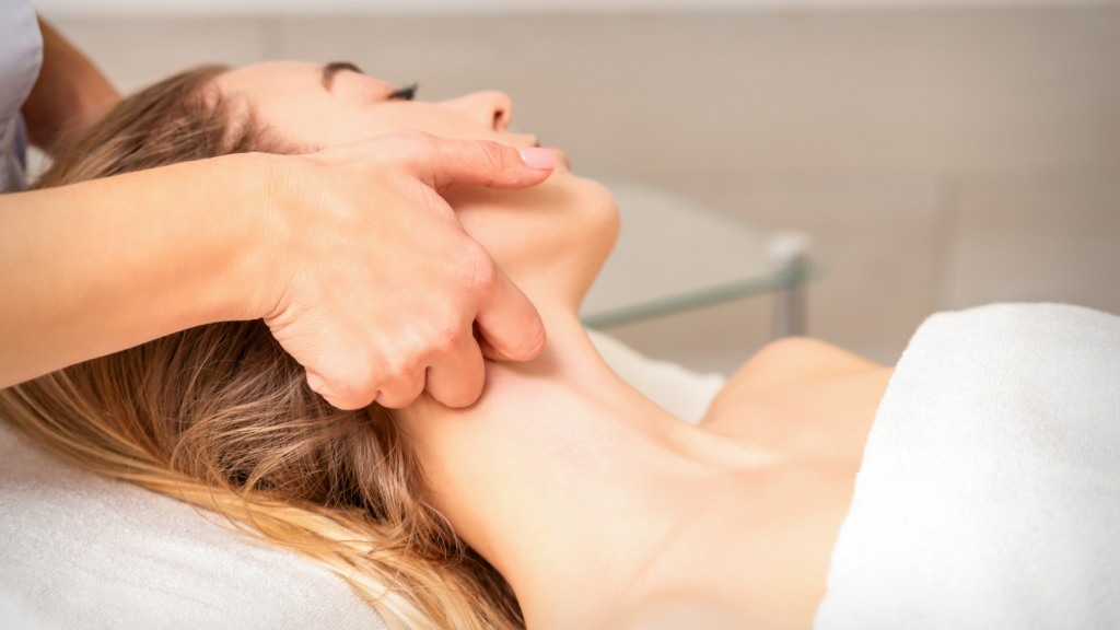 Face lymphatic drainage massage treatment at Viva Massage and Wellness in Edmonton