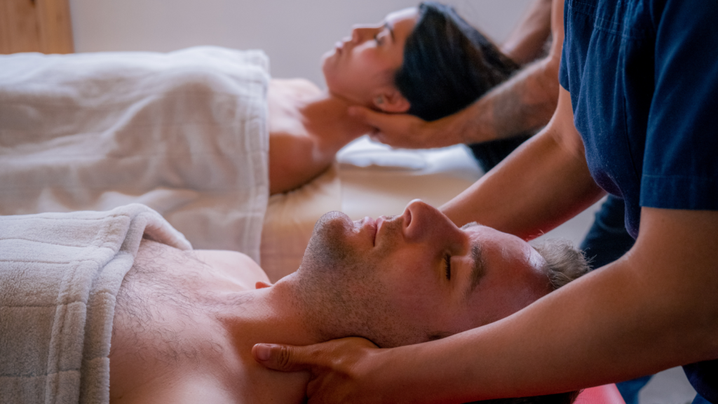Therapists providing couples massage in Edmonton for shared relaxation experience