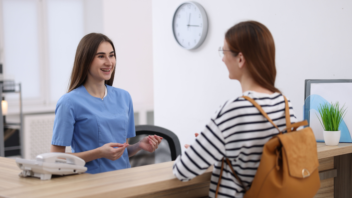 Massage therapy direct billing in Edmonton at clinic reception with client check-in
