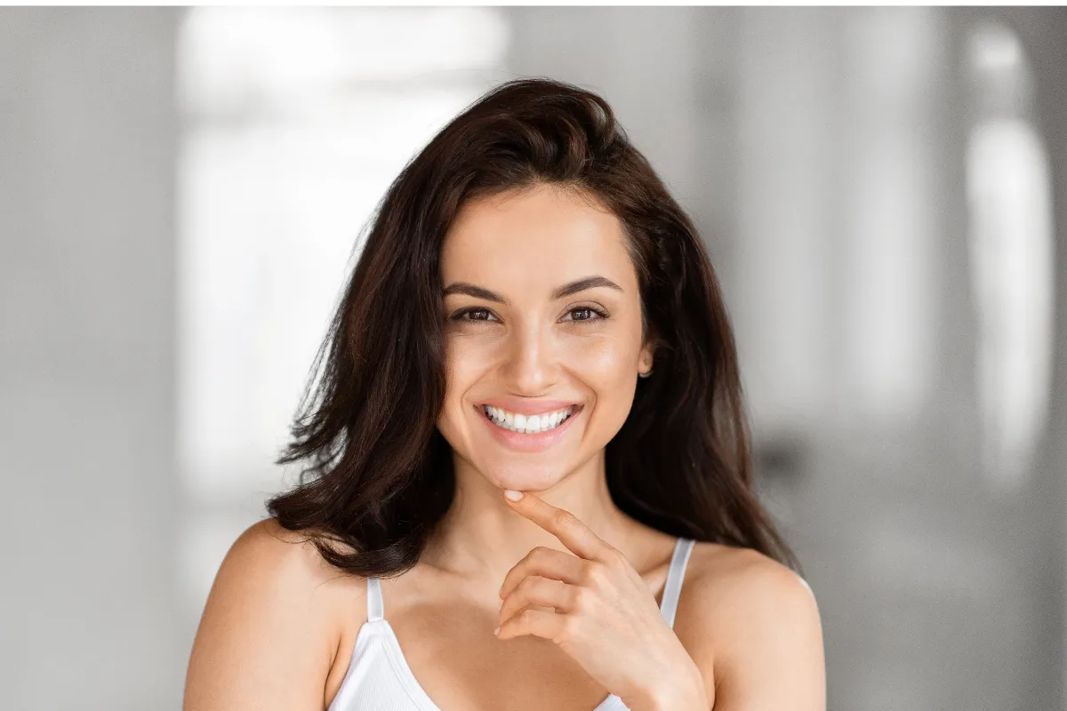 Client experiencing jaw pain relief after TMJ massage therapy in Edmonton